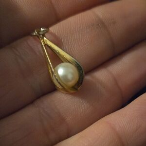 Elegant Gold and Silver Pearl Pendant